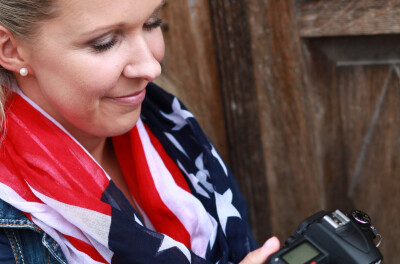 Teacher holding tablet with AI homework feedback under soft