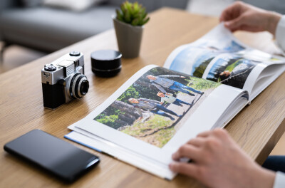 Teacher holding tablet with AI homework feedback under soft